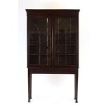 A 19th century mahogany display cabinet on stand,