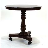 A 19th century mahogany table,