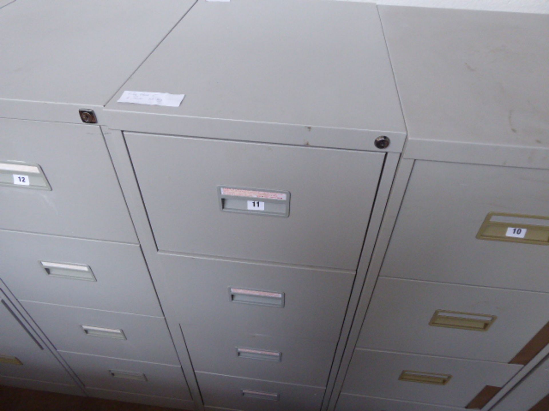 Grey metal 4 drawer filing cabinet