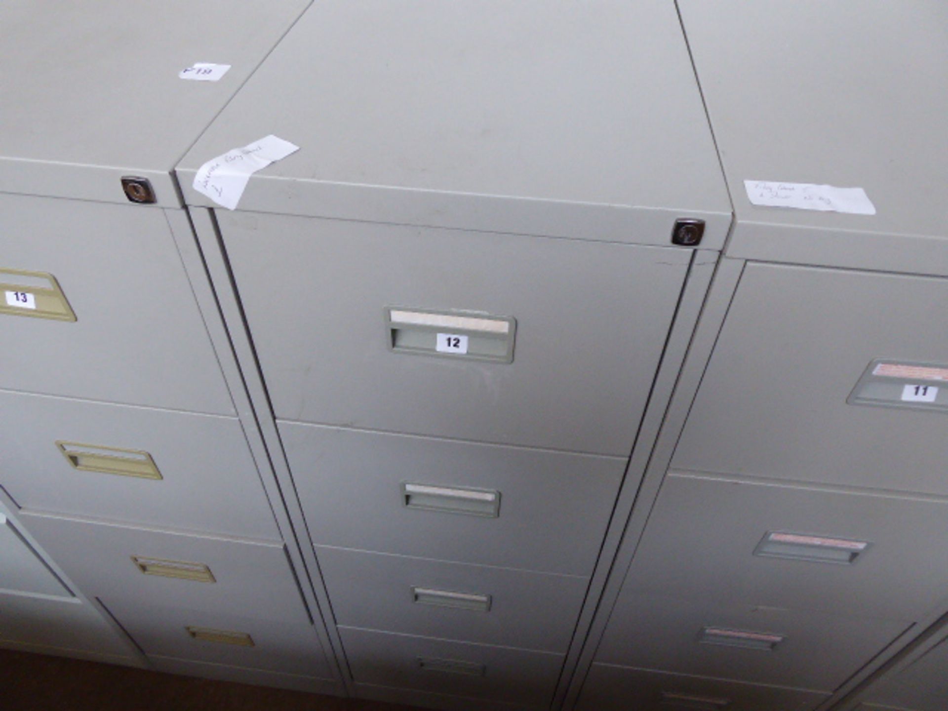 Grey metal 4 drawer filing cabinet