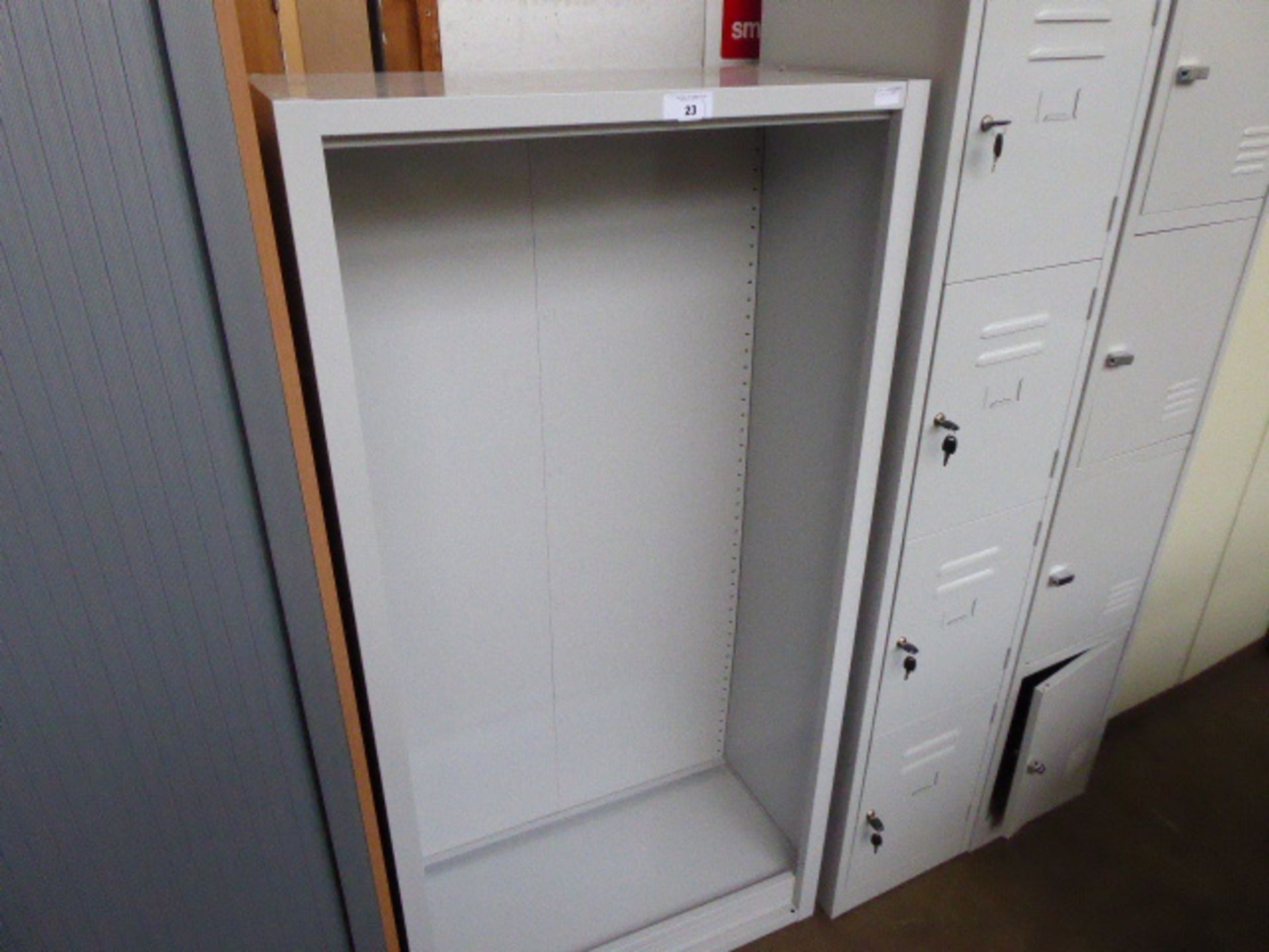 Grey metal open shelf unit with 4 shelves