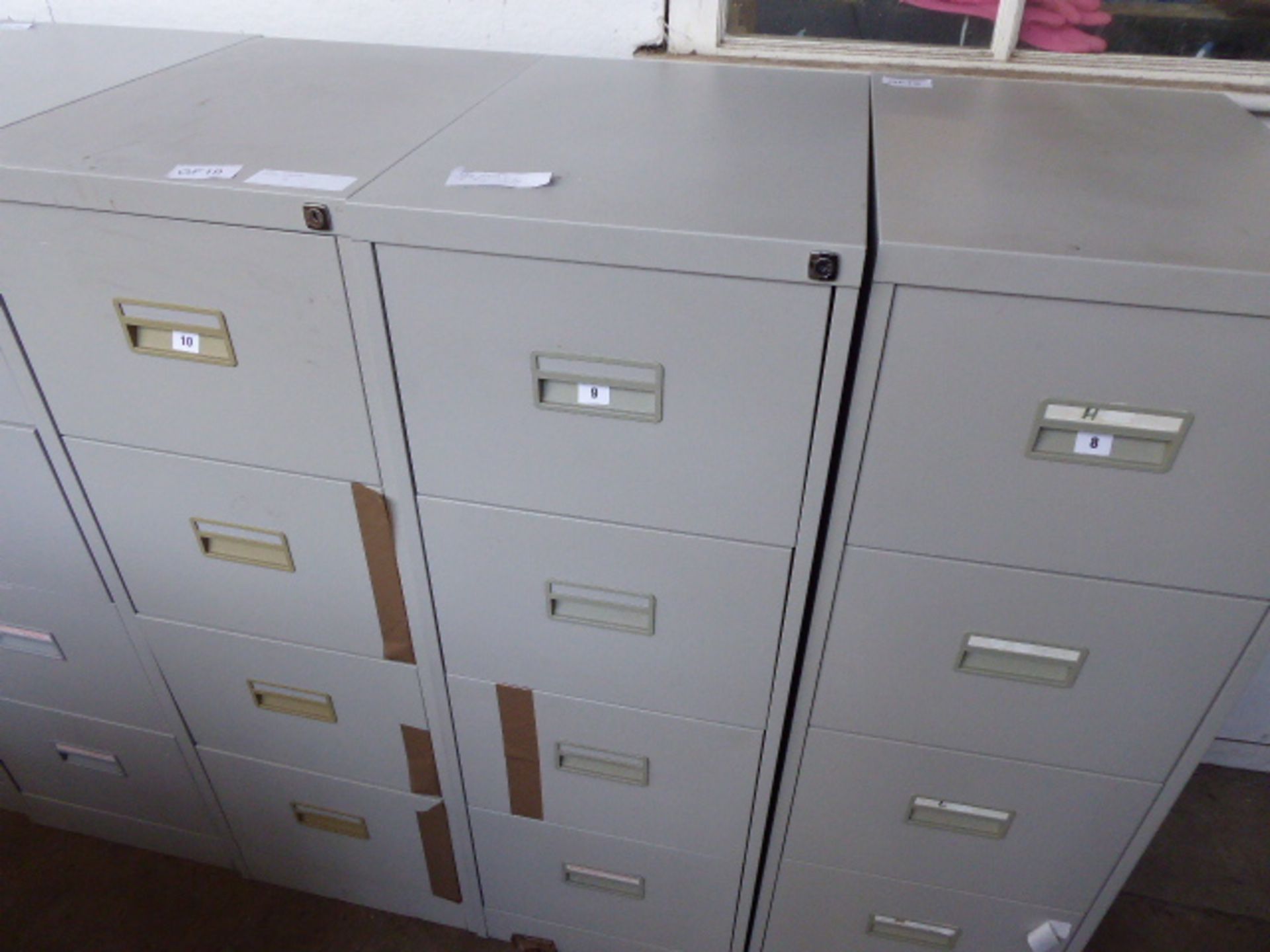 Grey metal 4 drawer filing cabinet