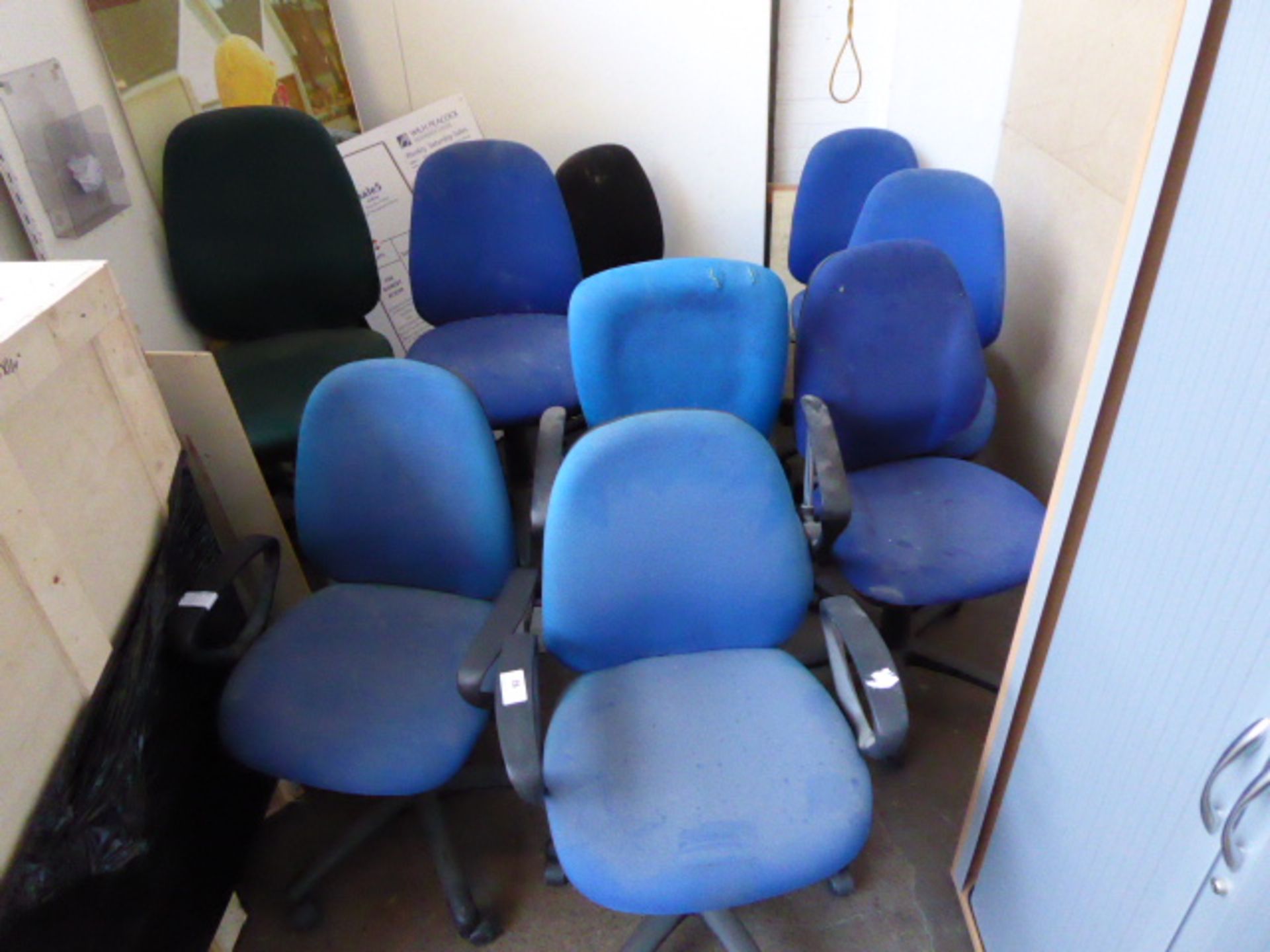 Nine assorted blue and green cloth office chairs