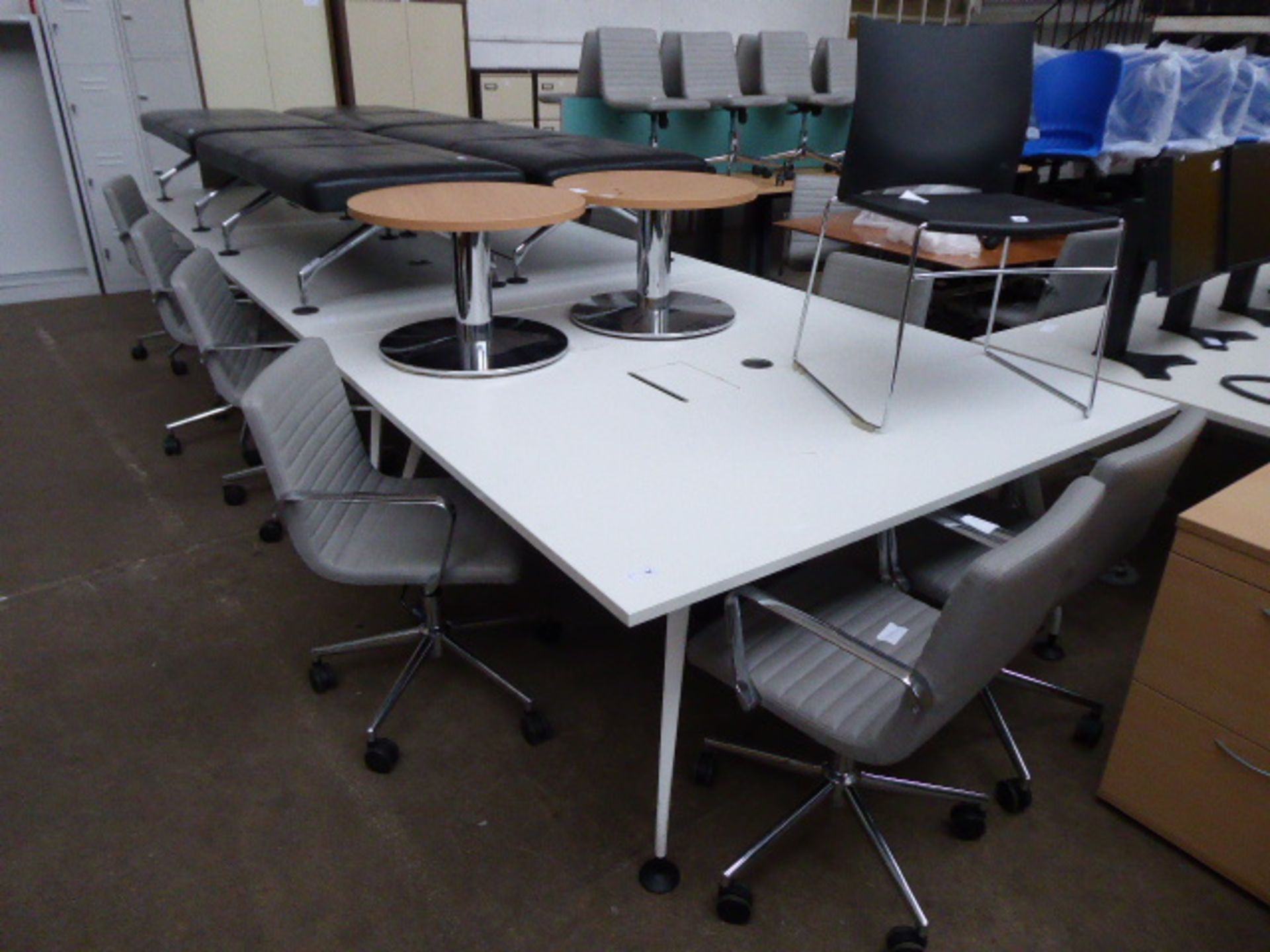 Large 3 section boardroom table on white metal powder coated legs with padded feet, measuring 480