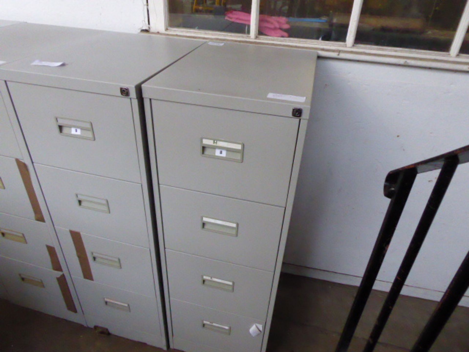 Grey metal 4 drawer filing cabinet