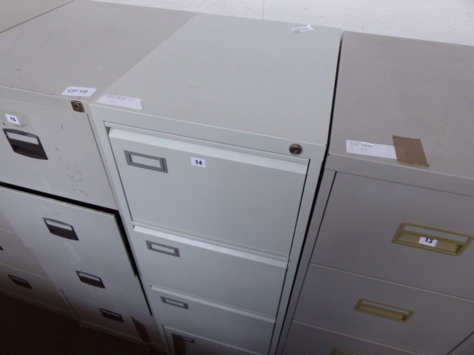 Grey metal 4 drawer filing cabinet