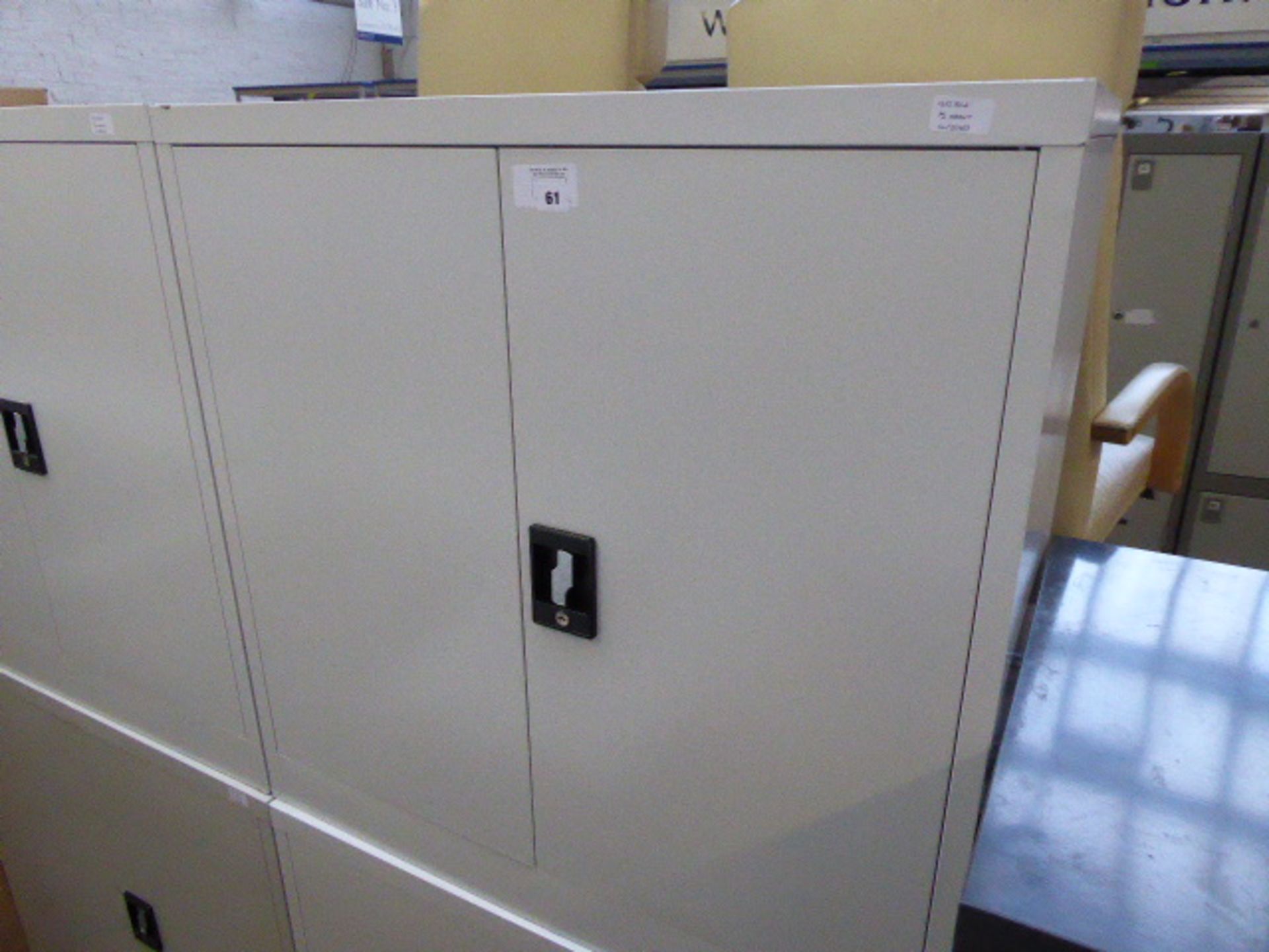 Two metal grey low level 2 door staionery cabinets