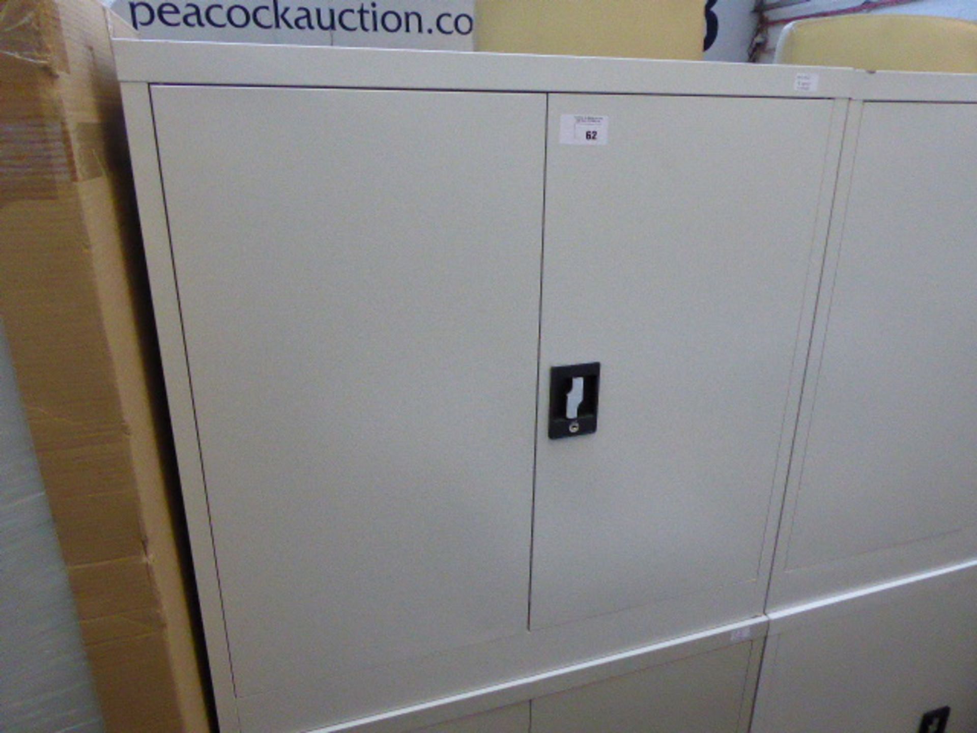 Two metal grey low level 2 door staionery cabinets