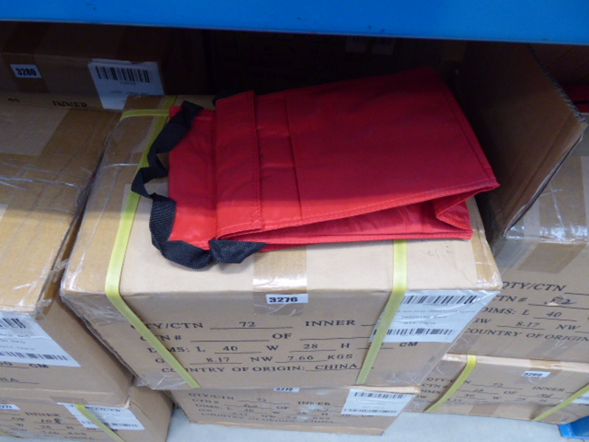 Box containing approximately 72 Lucky Lunch bags in red