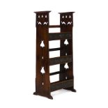 An Arts & Crafts oak bookcase in the manner of Shapland and Petter,
