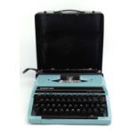 A cased Silver-Reed SR180 De Luxe typewriter