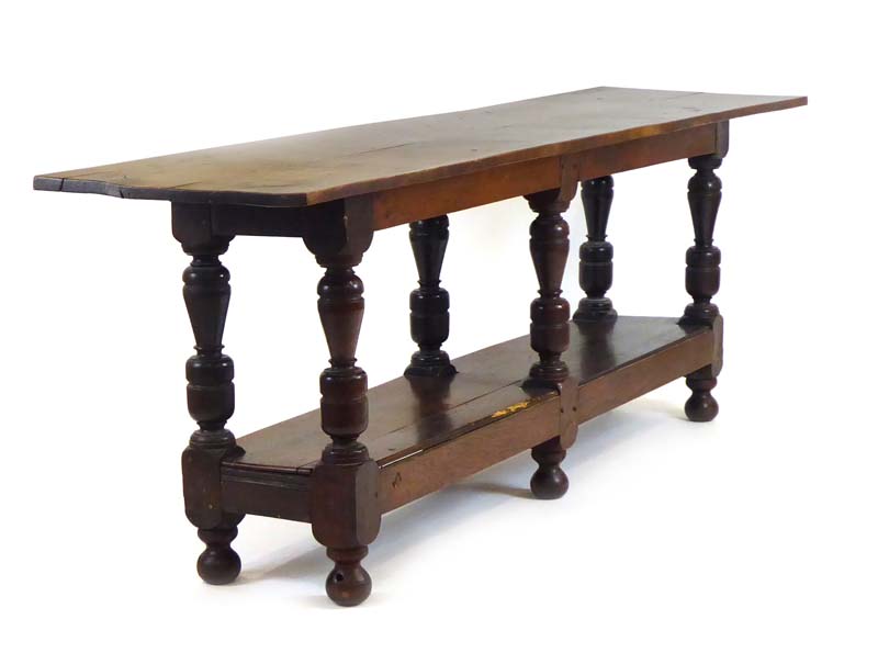 An 18th century-type oak refectory table,