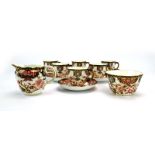 A Royal Crown Derby six sitting tea service comprising six cups, six saucers,