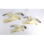 A set of three graduated Beswick wall plaques in the form of seagull's, Model no. 658, max w.