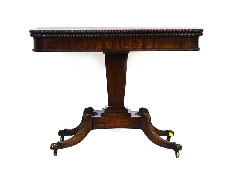A 19th century mahogany tea table,