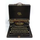 A cased 1920's American Underwood 'Standard Portable' typewriter