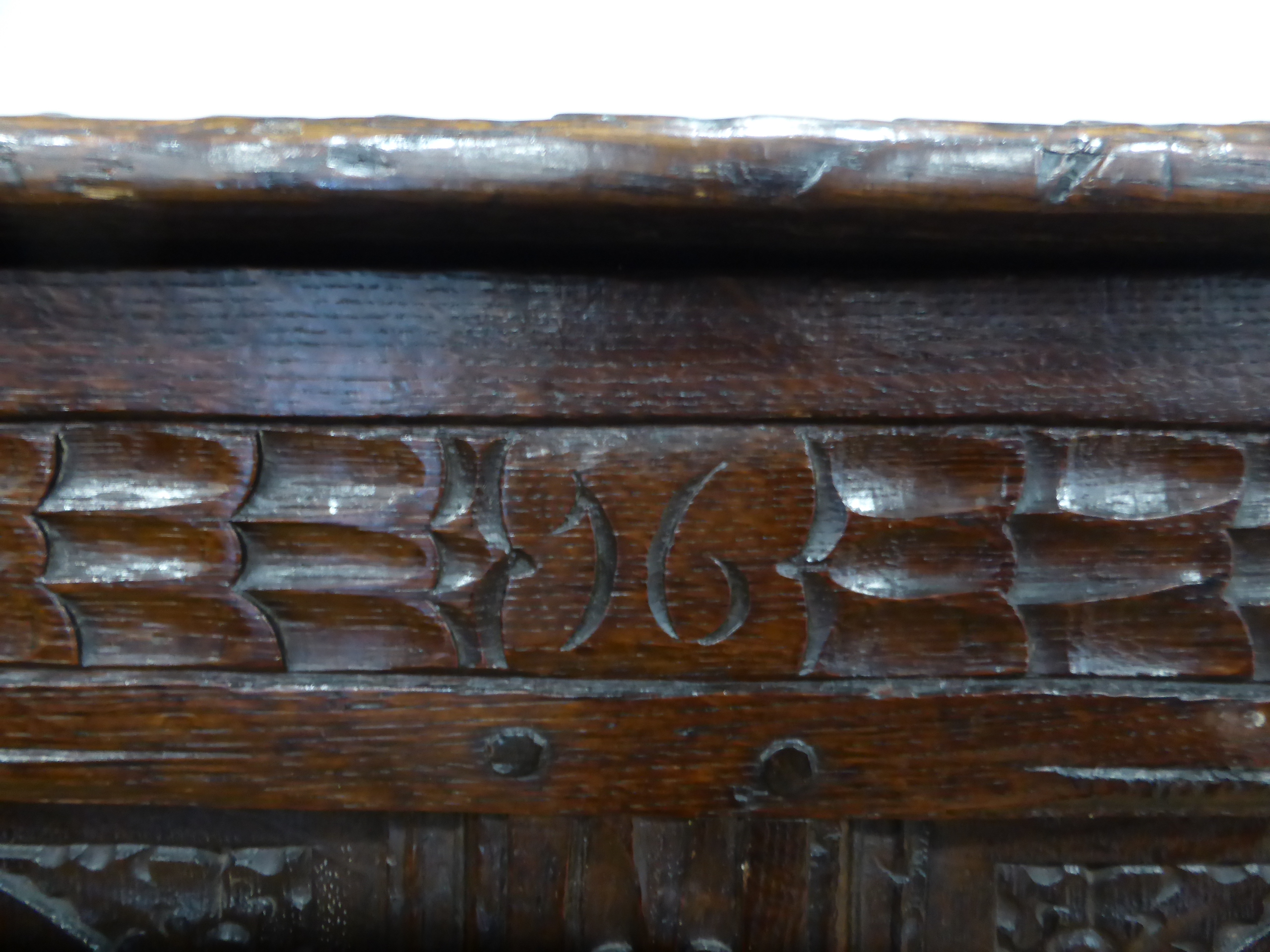 A 17th century and later oak coffer with panelled front and sides, dated 1615, - Image 16 of 19