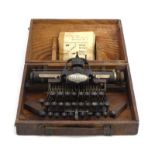 A cased American Blickensderfer No. 5 portable typewriter, c.