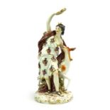 A late 19th/early 20th century continental porcelain figure modelled as Artemis and a deer, h.