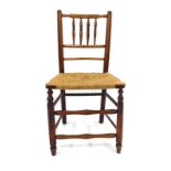 An early 19th century provincial elm kitchen chair with strung seat CONDITION REPORT: