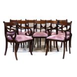 A set of eight early 20th century mahogany dining chairs with drop-in seats, including a carver,