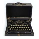 A cased 1920's American Underwood 'Standard Portable' typewriter