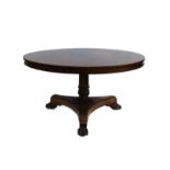 A William IV rosewood tilt-top dining table,