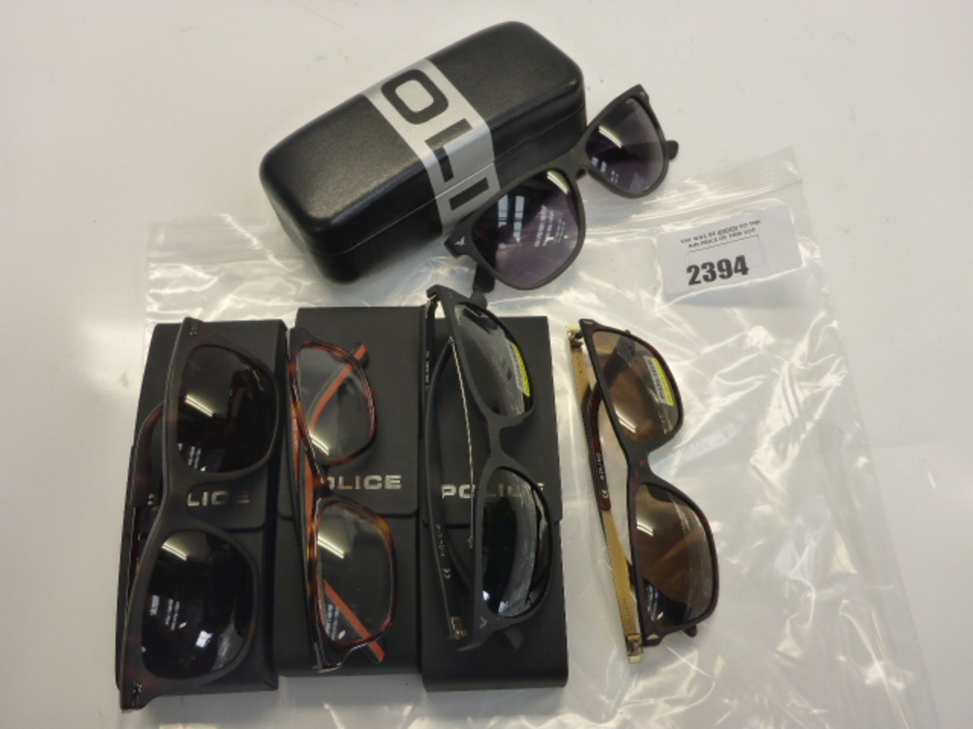 4 sets of. Police reading and sunglasses with cases with one loose set