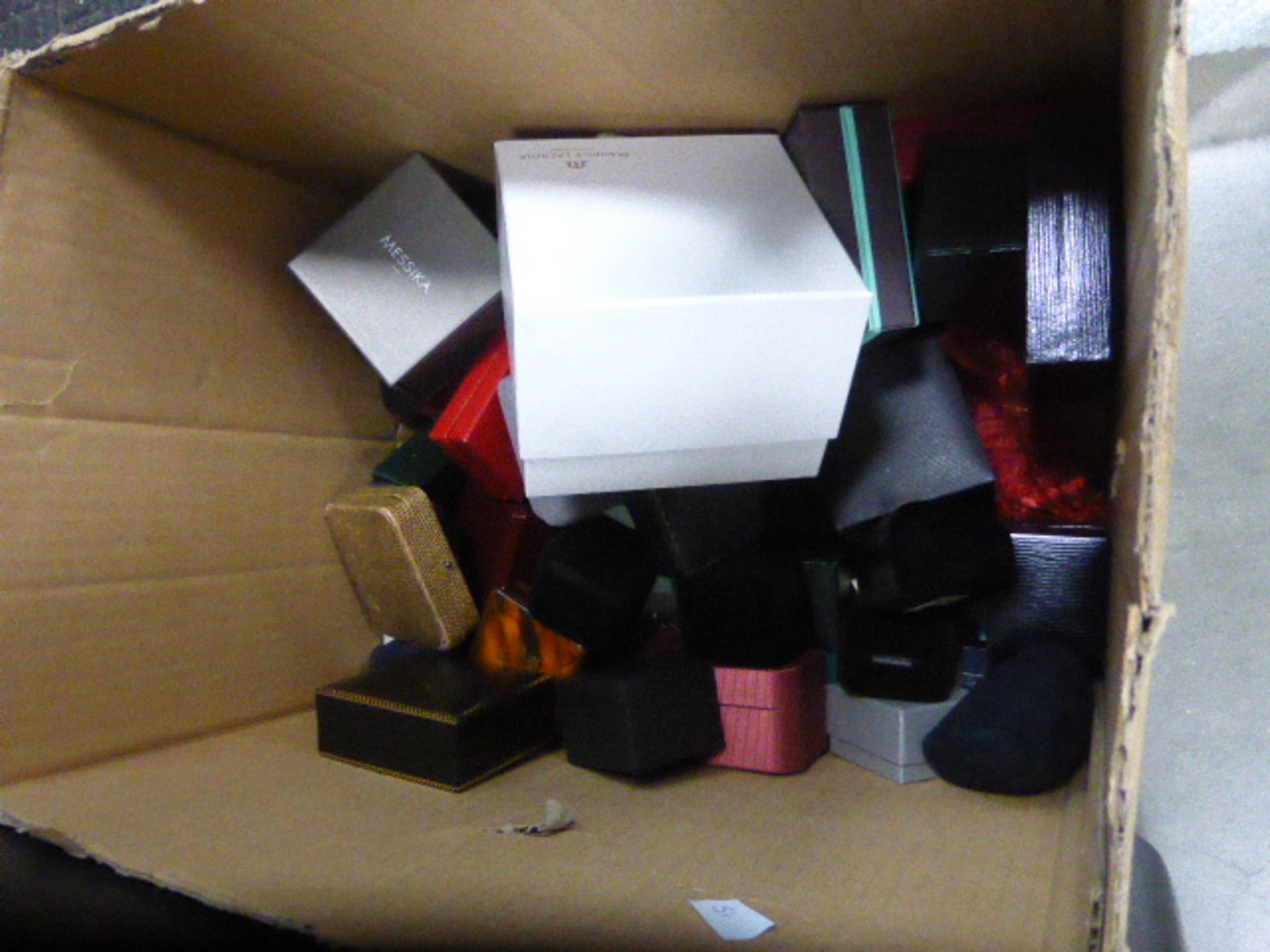 Cardboard box containing loose jewellery boxes, ring cases and watch boxes