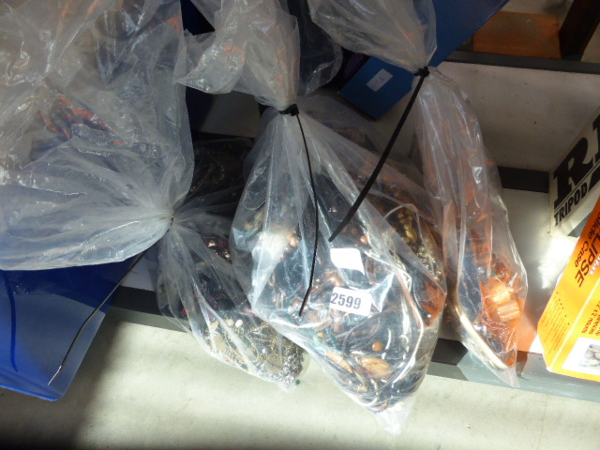 3 clear bags containing costume jewellery