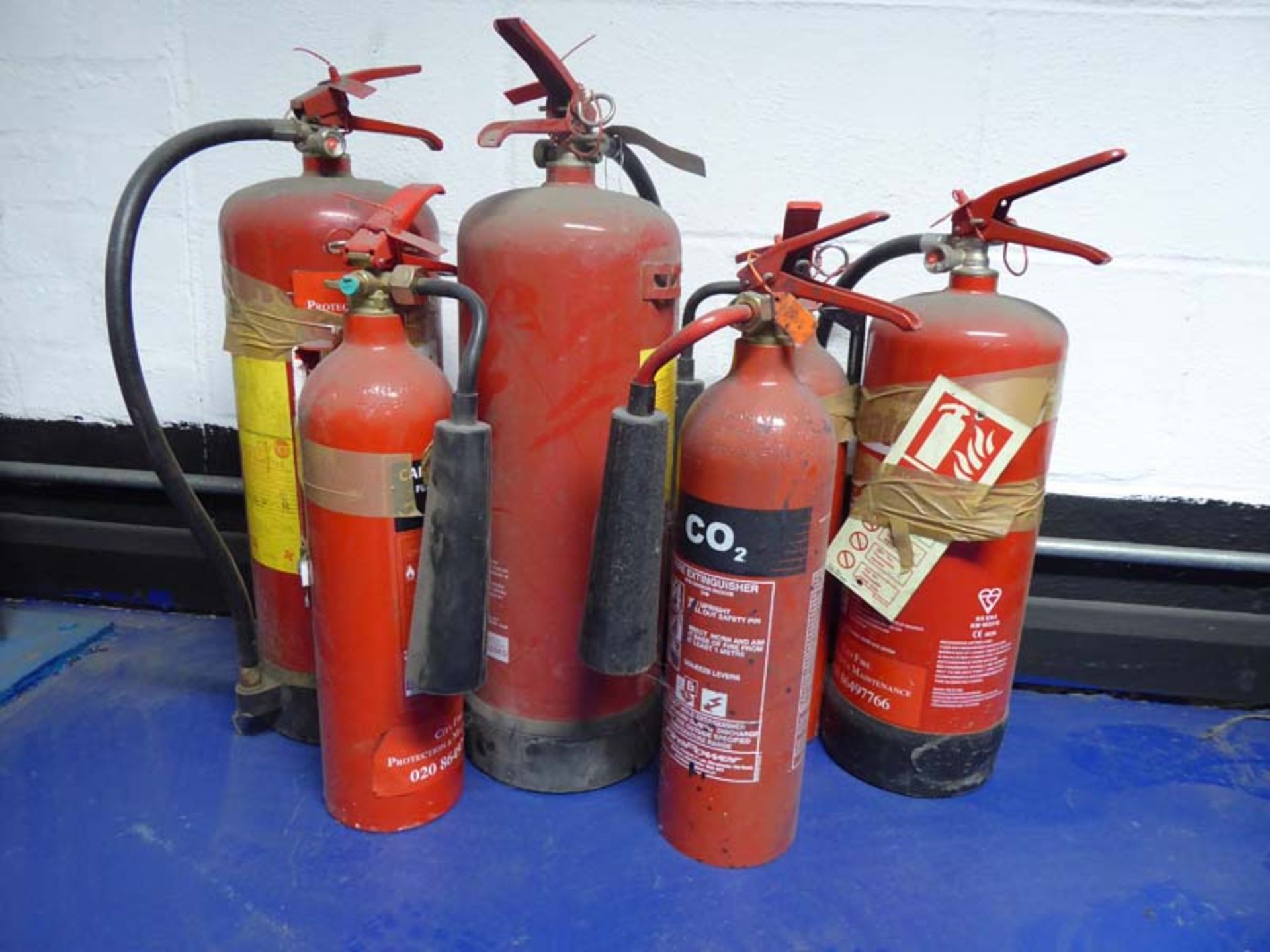 6 various fire extinguishers