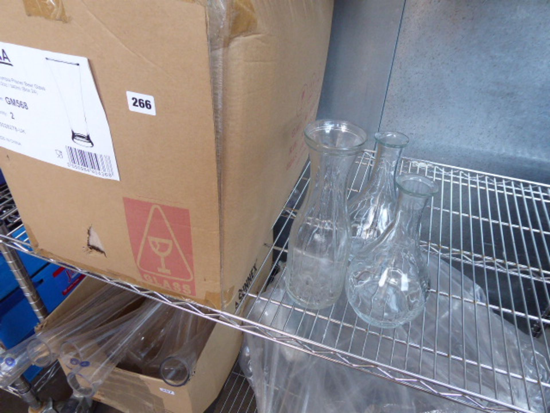 Large box of glass decanters