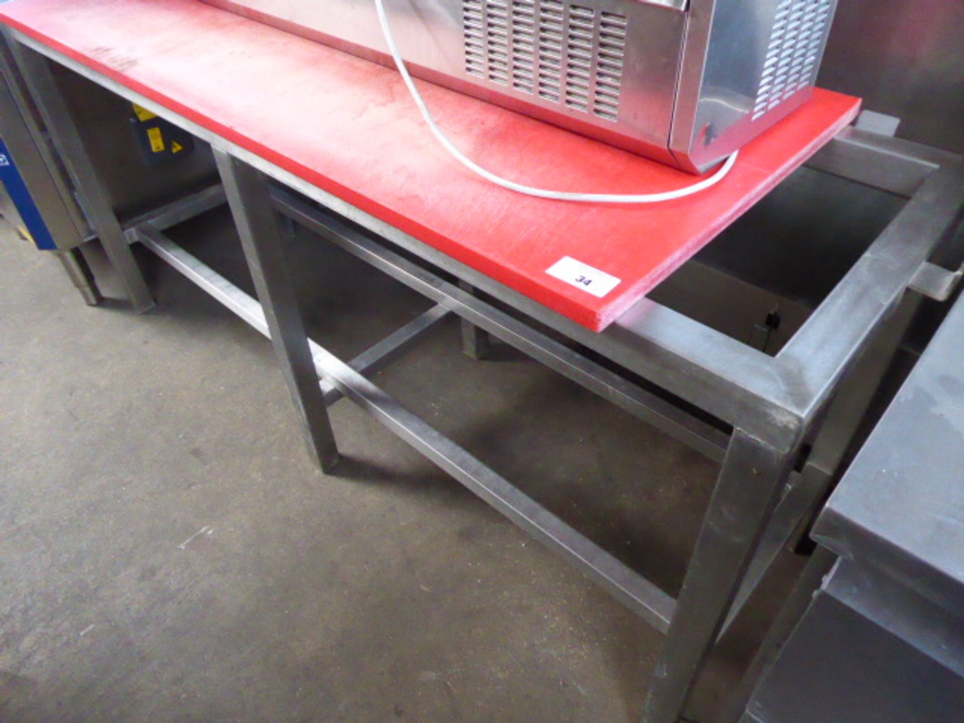 180cm heavy duty butchers block table base with slightly smaller red acrylic top