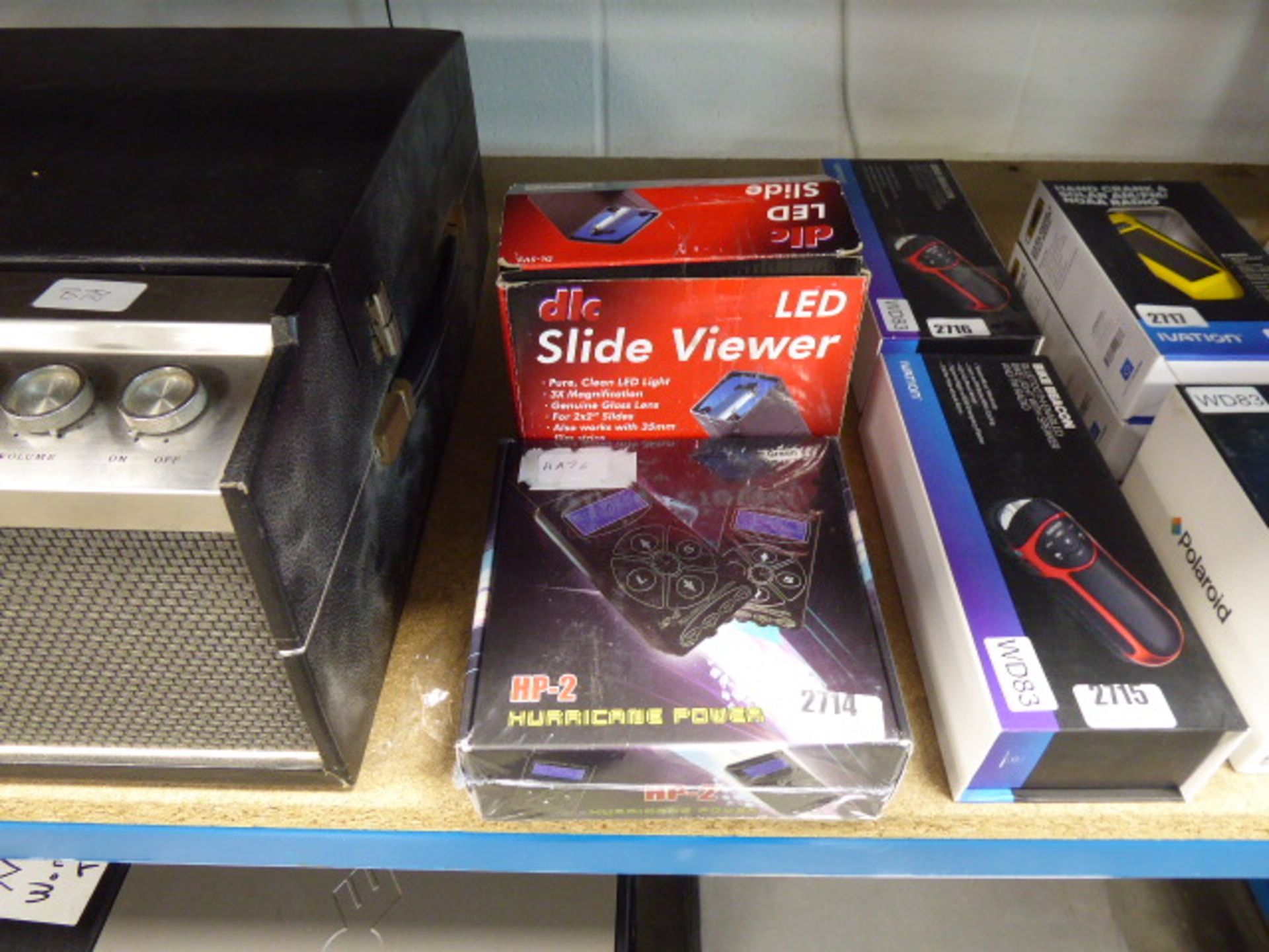 HP-2 Hurricane power module in box together with a DLC LED slide viewer