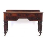 A 19th century mahogany dressing table with an arrangement of four drawers,