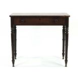 A Regency mahogany and walnut crossbanded writing table,