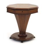 A Victorian walnut and marquetry sewing cabinet of trumpet form on a platform base, h.