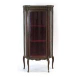 For Restoration: a French mahogany and brass mounted side cabinet,