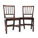 A pair of 18th century oak provincial dining chairs