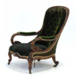 A 19th century mahogany and button upholstered fireside armchair,