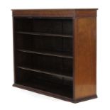 An Edwardian mahogany open-fronted bookcase with three adjustable shelves, w.