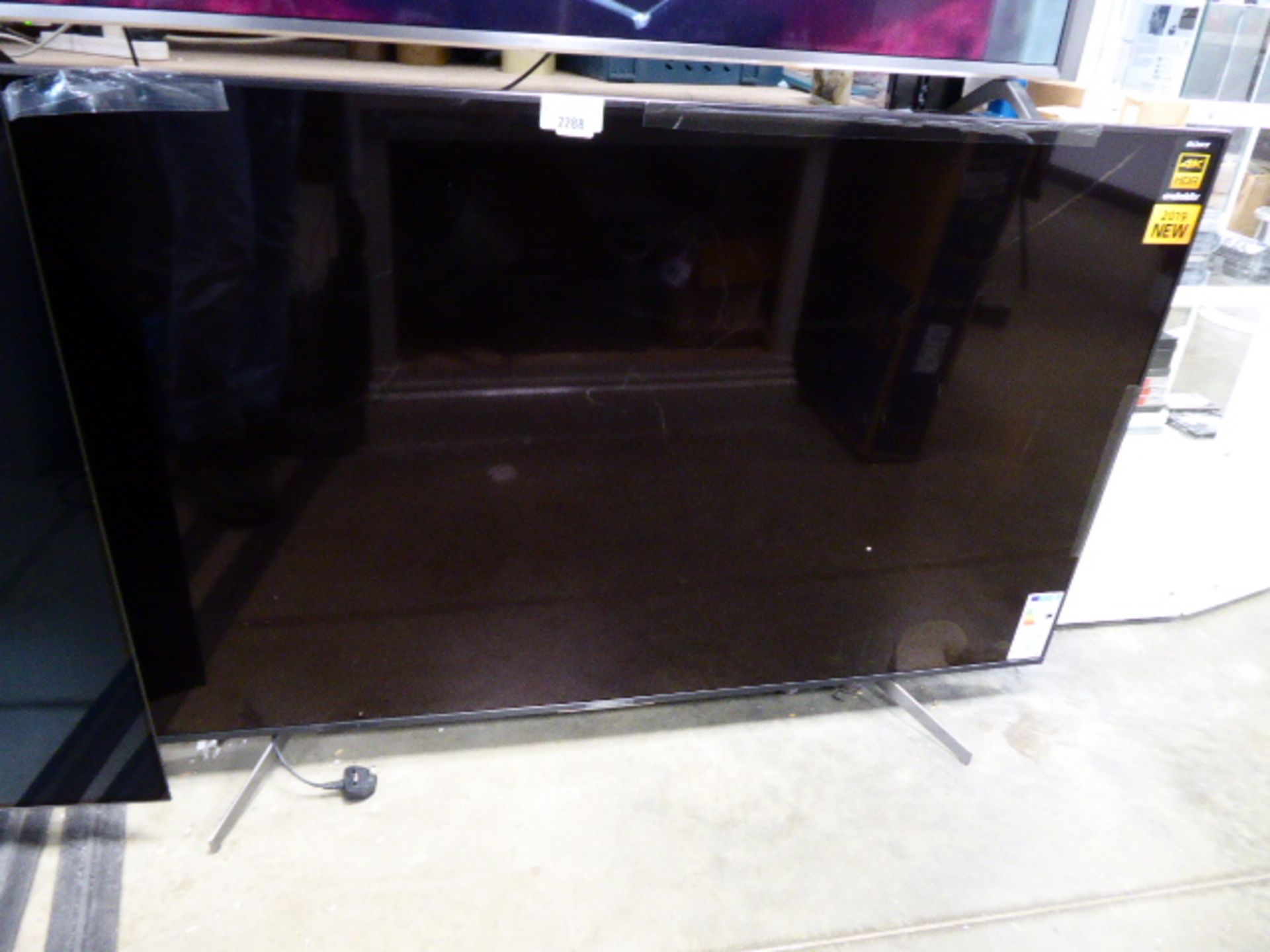 A 65'' Sony TV model KD65XG585 (af cracked screen)