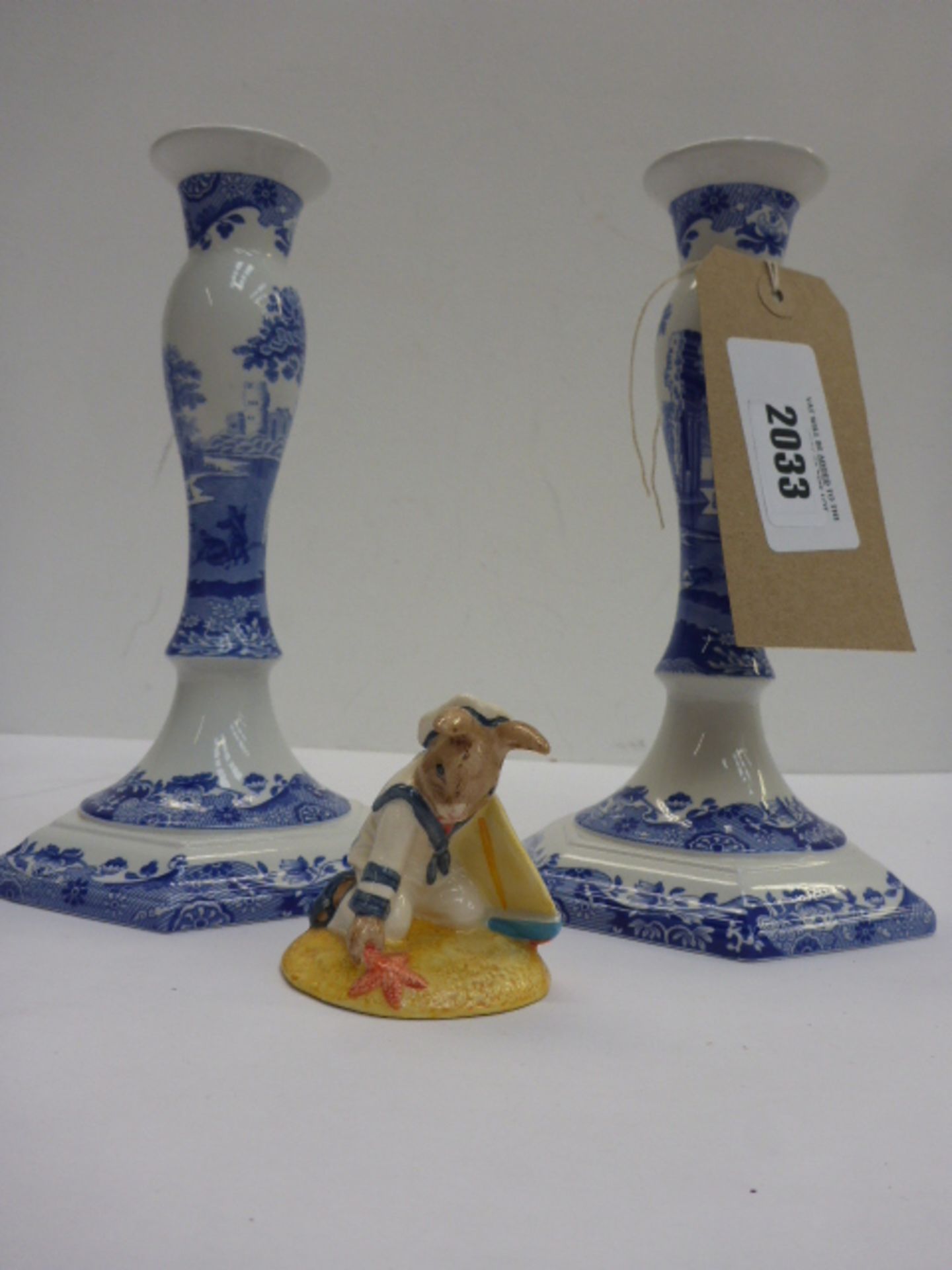 Pair of Spode 1816 blue and white candle holders and Royal Doulton Sailor Bunnykins figure