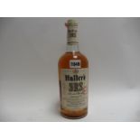 An old bottle of Haller's SRS Special Reserve Stock Blended Premium Quality 8year old Whiskey Phila