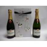 A box of 2 bottles of Taittinger Brut Reserve Champagne 75cl each (Note VAT added to bid orice)