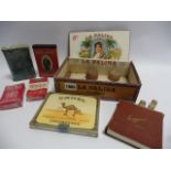 A Cigar Box with assorted old packets of Cigarettes,