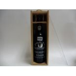 A bottle of Wiese & Krohn Colheita 1966 Port from Vila Nova de Gaia with own wooden box 75cl