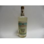 An old bottle of Ronrico White Label Puerto Rican Rum 80 proof Imperial Quart circa 1972 with US