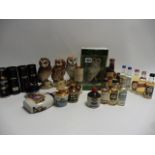 A small collection of mostly Whisky miniatures including a 1984 Whyte & Mackay Snowy Owl by Royal