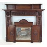 A Victorian mahogany fire surround with a gallery and mirrored overmantle,